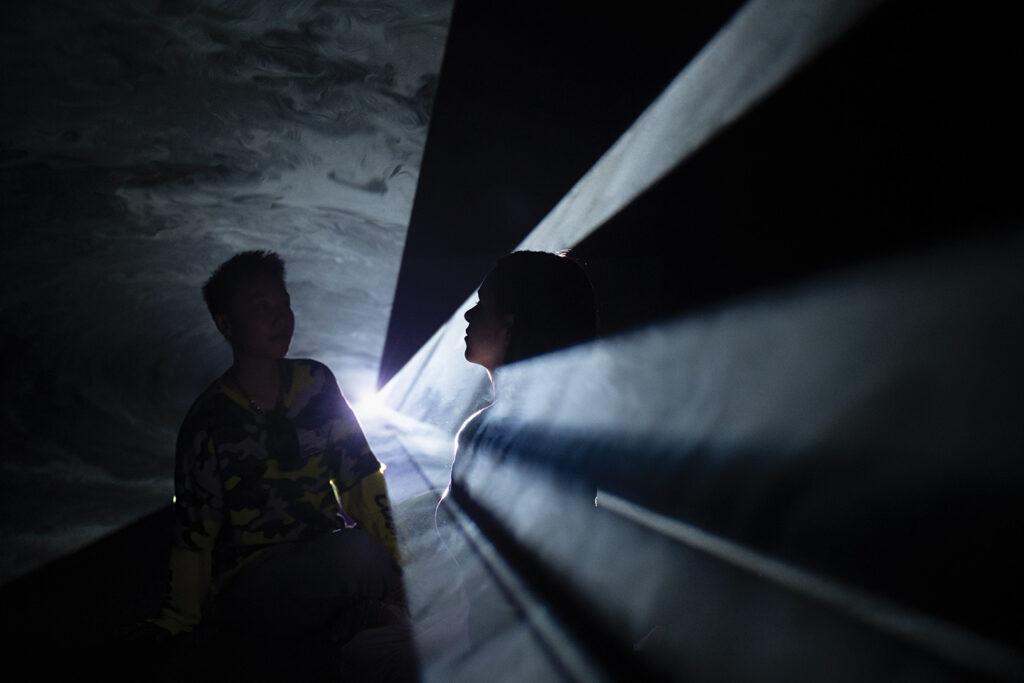 Anthony McCall Solid Light, intersecting light planes at Tate Modern