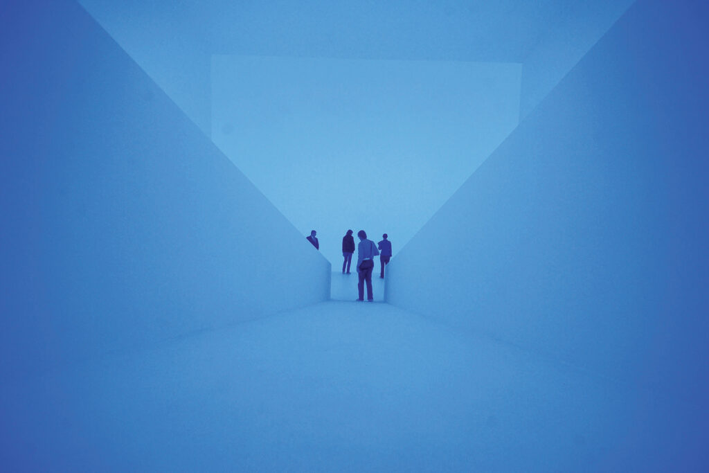 Journalists look at the light installati