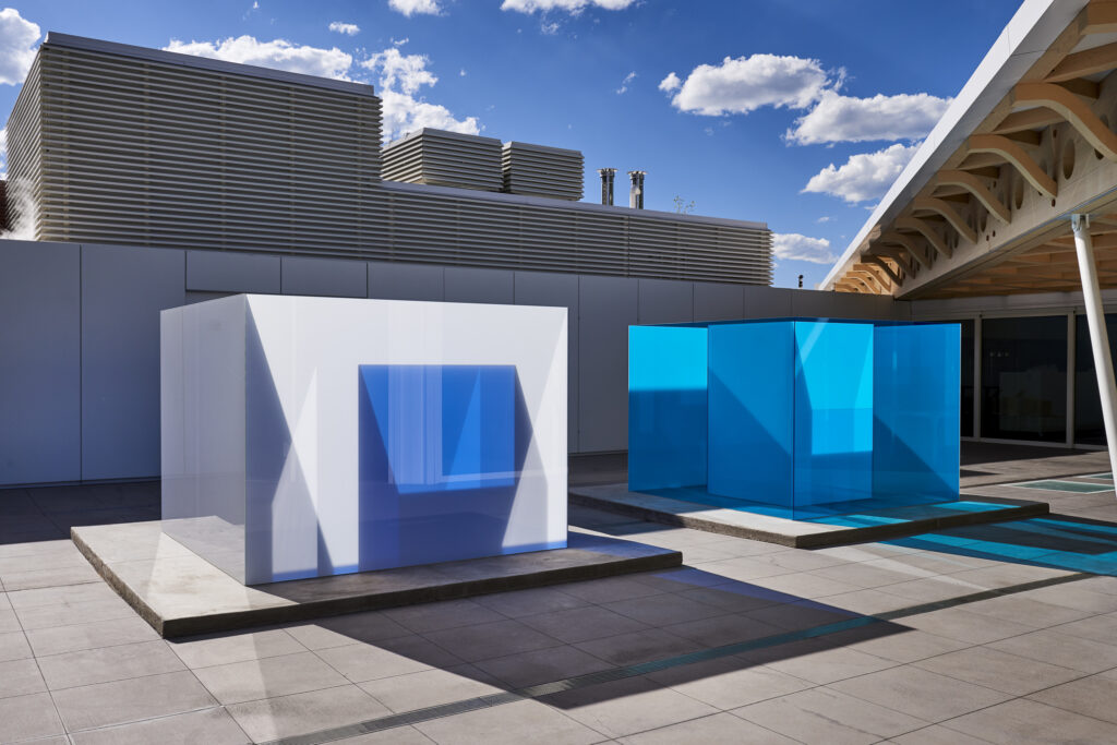 cubes of blue and white reflect light on the roof of the Aspen Art Museum