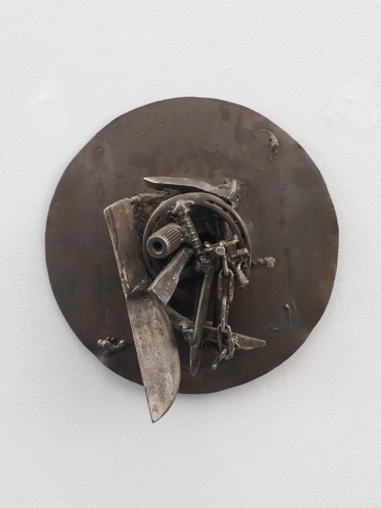 detail of a metal sculpture made from welded mechanical parts