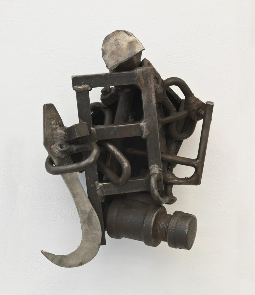 detail of a metal sculpture made from welded mechanical parts