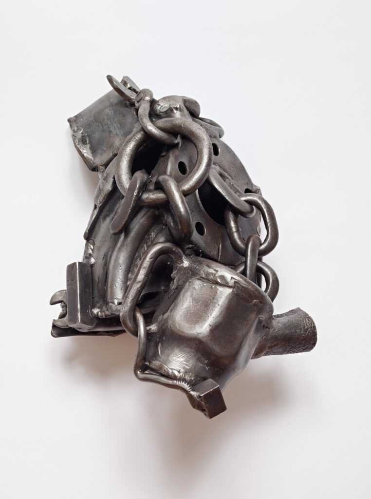detail of a metal sculpture made from welded mechanical parts