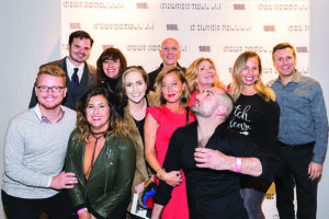 a group of people celebrating the theatrical premiere of "One Woman Sex and the City" at Oklahoma Contemporary