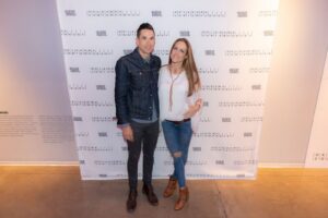 two people pose for a photo