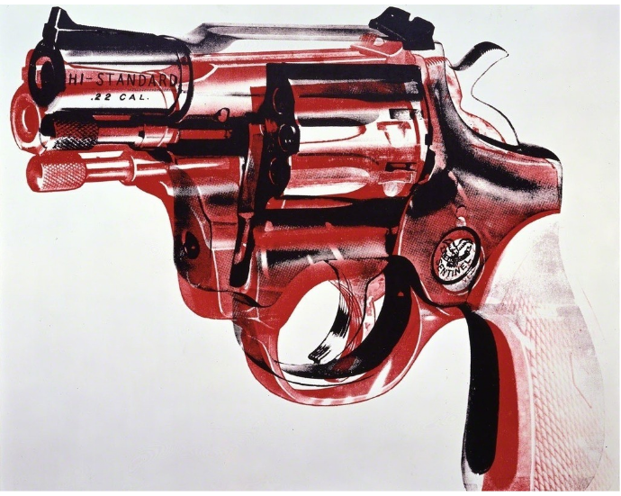 a close up detail of a handgun in black and red on a white background