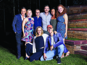 a group of people pose for a picture