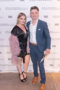 two people pose for a photo